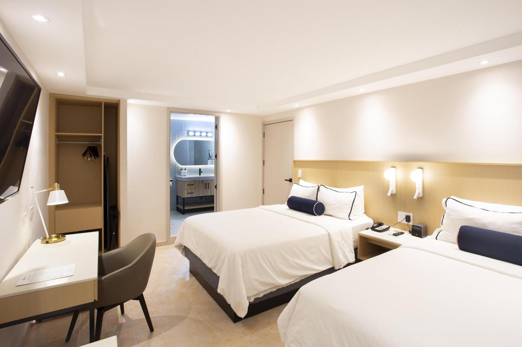 Queen Suite with Two Queen Beds, Sofa Bed and Living Room - Non-Smoking,1756537340:JPEG